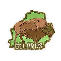 Souvenir (magnet) from Belarus with the image of a national nature reserve and bison isolated on white background