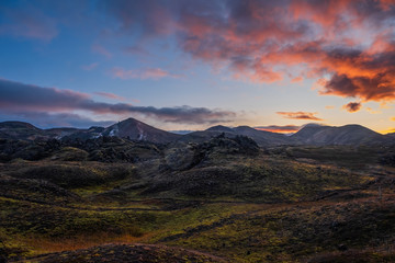 Iceland in september 2019. Great Valley Park Landmannalaugar, surrounded by mountains of rhyolite and unmelted snow. In the valley built large camp. Evening in september 2019