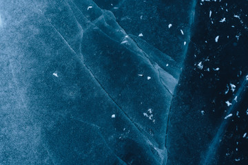 Beautiful ice texture with cracks and bubbles. winter background