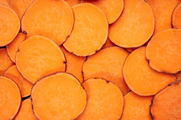 Agricultural Sweet Potato Vegetable Cut Slices. Heap of Dietary Natural Product Orange Batata....