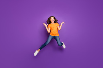 Full length body size view of her she nice attractive lovely pretty crazy overjoyed cheerful cheery wavy-haired girl jumping having fun fooling isolated on lilac purple violet pastel color background
