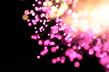 colorful glowing lights and light dots with bokeh close-up