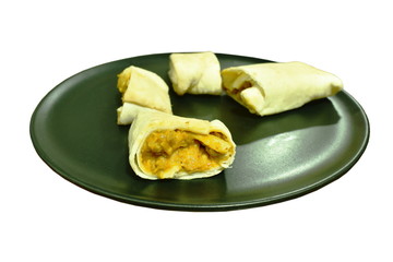 roti stuffed chicken curry sauce cutting on plate