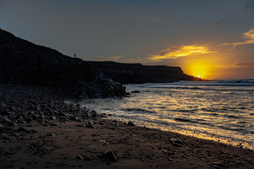 costa mar atardecer acantilado piedras