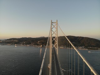Obraz premium Suspension bridge over sea