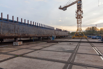 ship yard with rusty ship