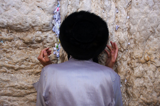 Praying at the Western Wall in Jerusalem