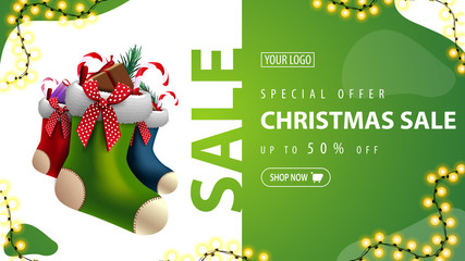 Special offer, Christmas sale, up to 50% off, green discount banner with Christmas stockings and garland © DDevicee