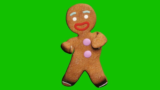 The gingerbread man is dancing a Christmas dance. The concept of the celebration. Looped animation in front of green screen.