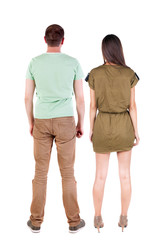 Back view of couple. beautiful friendly girl and guy together.