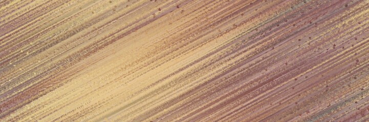 diagonal color lines background rosy brown, pastel brown and khaki colors. seamless repeating graphic can be used for wallpaper, background or textile fashion