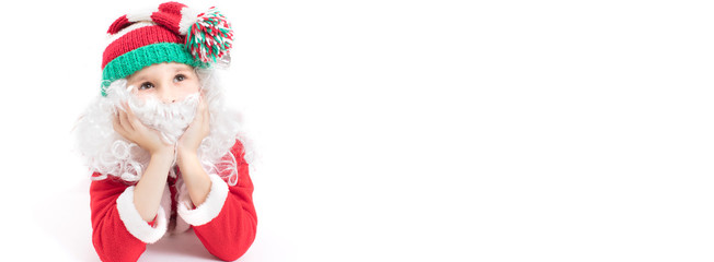 Banner child in a suit of Santa Claus on a white background. The face of a Christmas boy with a beard in a hat.