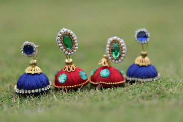 Hand made colorful Earring with blurred background