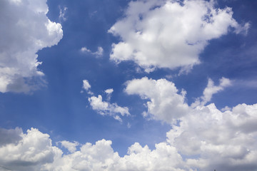 Naklejka na ściany i meble Blue sky and white clouds clouds.