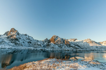 Amazing Sunset during blue hours Over Mountain And Fjord, Winter Landscape, Norway