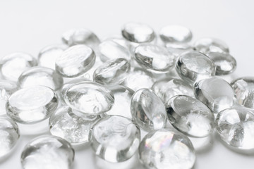 Scattered crystals on white background, beautiful gems