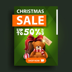 Christmas sale, up to 50% off, green vertical discount banner with button and present with Teddy bear