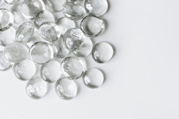 Scattered crystals on white background, beautiful gems