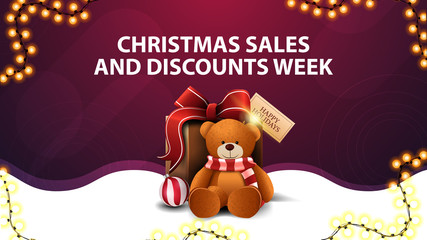 Christmas sales and discounts week, white and purple discount banner with garland, wavy line and present with Teddy bear