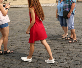 tourists walk on the square in the old town in Prague