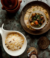 traditional azerbaijani pilaf rice served with roasted beef and dried fruits