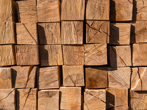 Beech lumber folded on a sunny day. Background image.