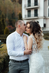 Happy couple having great time together . Handsome man and attractive young woman are in love. Young couple in love on a autumn day.