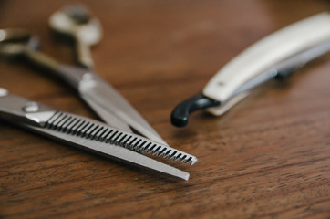 close up of barber tool on wooden table