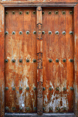 Traditional wooden carved door in Stone Town, Zanzibar, Tanzania, Africa