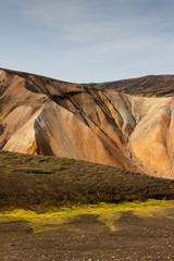 Colorful slopes of mountains, yellow sand gravel, steep loaf, Landmannalaugar, Iceland