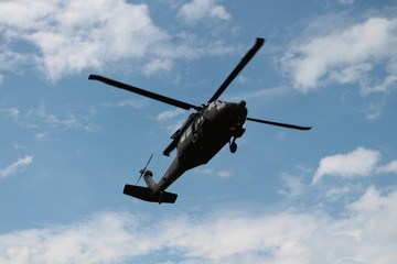 Helicopter fly in the sky.