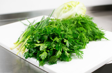 Fresh herbs on a cutting board
