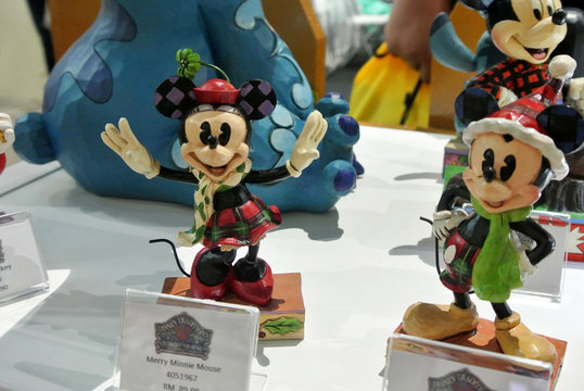 KUALA LUMPUR, MALAYSIA -APRIL 8, 2018: Fictional cartoon character from Disney called Mickey Mouse. Collector item of Mickey Mouse action figure display on a table. 