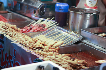 Crispy fried meatballs with dipping sauce.