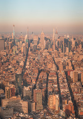 Sunset aerial view of New York City looking over midtown Manhattan towards uptown. teal and orange style