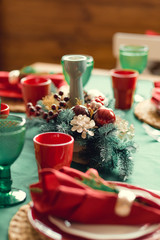 Christmas decor in kitchen. Christmas tableware. Christmas cooking utensils. Bright interior of New Year's cuisine. New Year card template. White Mint Colors Kitchen. Christmas tree in the kitchen.