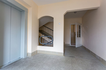 staircase hall in an apartment building  at the entrance to the elevator