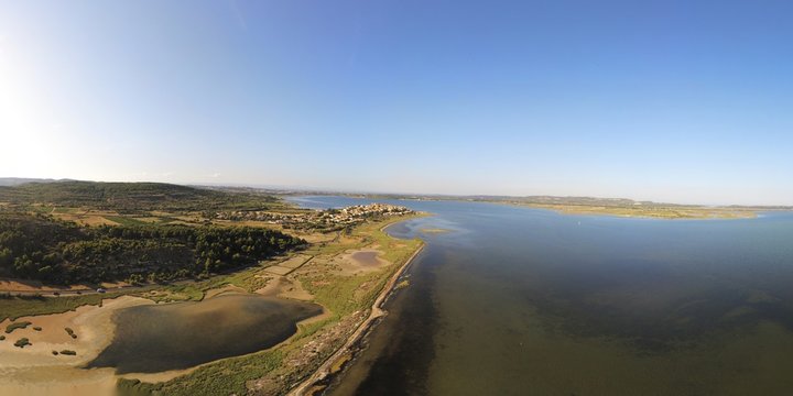 Panorama of Bages and its pond viewed from air