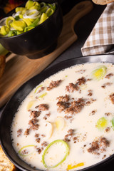 Delicious cheese and leek soup with minced meat