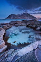 Rocky coastline on the Lofoten in northern Norway at dawn