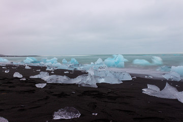 Washed out icebergson black beach in jokulsarlon lagoon iceland, Jökulsárlón