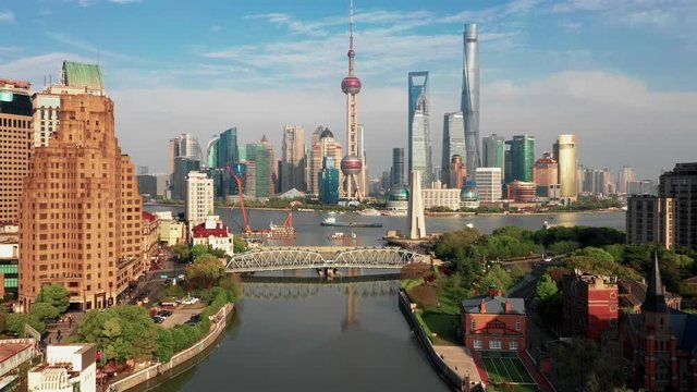 Aerial view of Lujiazui(The bund) in Shanghai, drone fly over the bund and huangpu river in morning day time