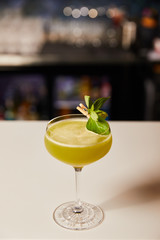 fresh alcohol cocktail in glass on bar counter