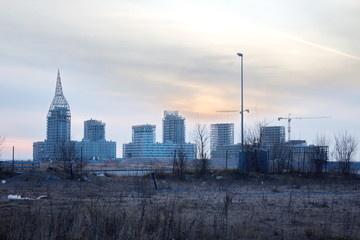 Fototapeta na wymiar Urban construction on the outskirts of the city