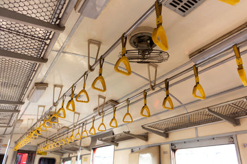 The handle and hung when standing on the train