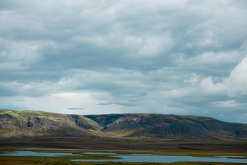 Mountains and cloudy skies