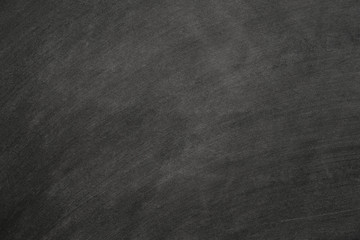 Abstract texture of chalk rubbed out on blackboard or chalkboard, concept for education, back to school, creatively, teaching , etc.