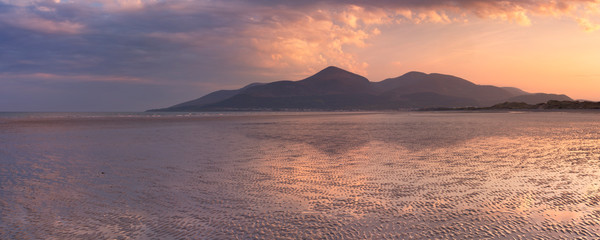 Beach and mountains in Northern Ireland at sunset