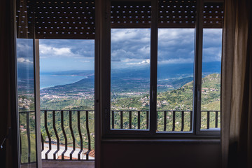 Balcony of a hotel room wih a splendid view in Castelmola, small town on Sicily Island, Italy