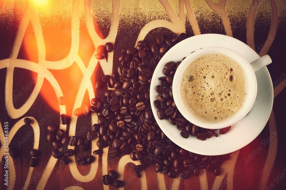 Canvas Prints cup of coffee and scattered coffee beans on background